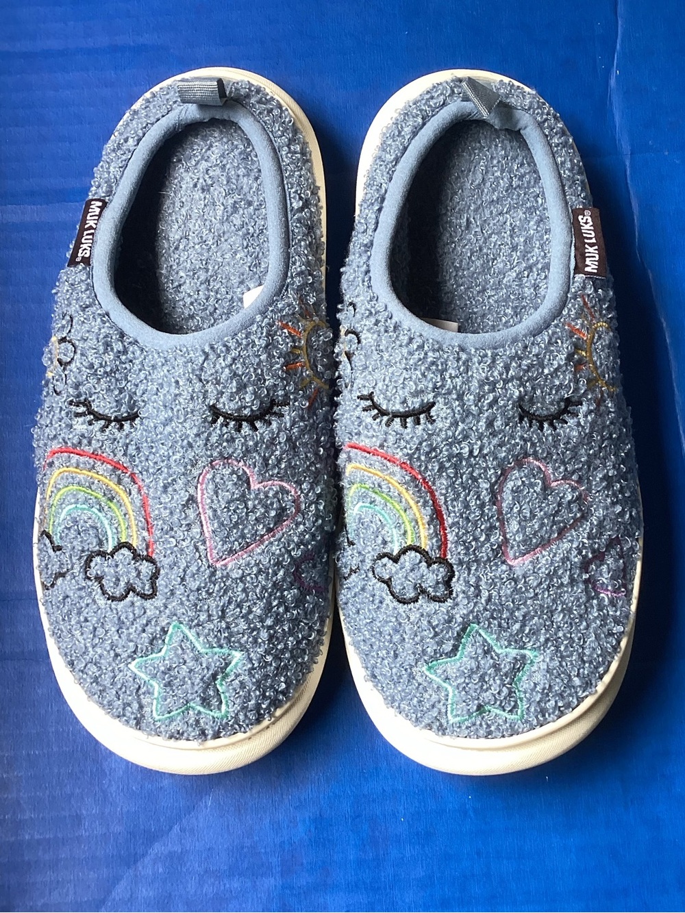 Muk Luks Blue Sherpa Slip-On Shoes with Rainbow & Heart Embroidery, size 7-8